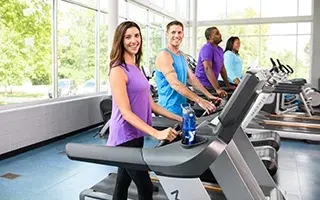 Girl walking on treadmill